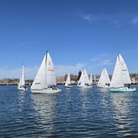 Santana 22s start in the Estuary at IYC's Sadie Hawkins.