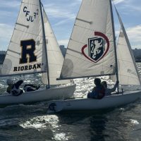 Boats from Riordan and Convent/Stuart Hall race against each other.