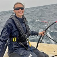 “Captain” Merritt Sellers steers her family’s J-111 No Surprise in stormy seas with just her dad Scott onboard as they double hand their way to Mackinac Island in the 102nd Port Huron Race.