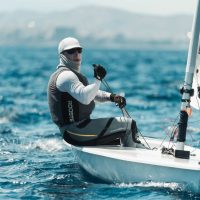 Al Sargent beating the Greek heat near the windward mark.