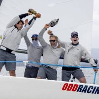 The 'Odd Racing' team celebrates winning the 2026 J/70 National Championship.