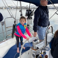 Rachel-Lynn-at-the-helm-in-San-Pedro-Robert-Feld