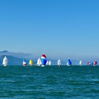 J/105s and Express 27s sail downwind during the Sausalito Yacht Club RegattaPRO Winter One Design Series.