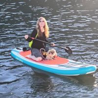 Heather-taking-the-dog-for-a-walk-onshore-in-Tiburon©Gregory-Clausen