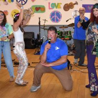The Trippiest fleet rounded out the competition. The hippies on the left won out over the magic mushroom lady on the right. Andy Schwenk is in the middle eliciting audience reaction.