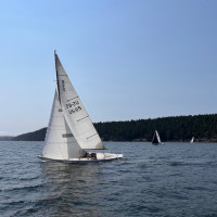 Challenge in Upright Channel – Peg Gerlock. This is Challenge (6-meter), the 90-year-old boat that finished first in PHRF-B with Wally Lum (who has raced is all 54 Shaw’s) at the helm. Nice quote from Skipper Michael Durland about sailing through the fog.