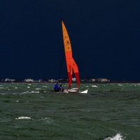 Black squalls arrived but the fleet and the race committee managed it all.