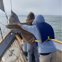 2.	Two campers recreate the ‘Titanic pose” as Seaward is sailing in the bay, heading towards San Francisco, CA.