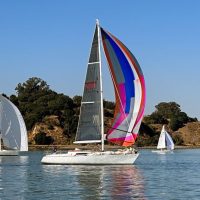 A light-air Vallejo 1 sails along the south side of Mare Island en route to Vallejo.