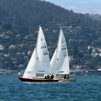 Two Folkboats battle upwind in the moderate Fall breeze of Knox.