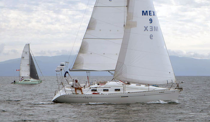 A Beneteau and a trimaran sailing