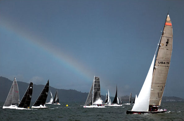 Rainbow over yachts racing