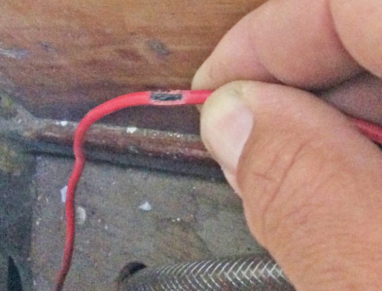 Frayed red wire