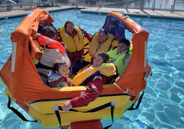 Inflated liferaft in pool.