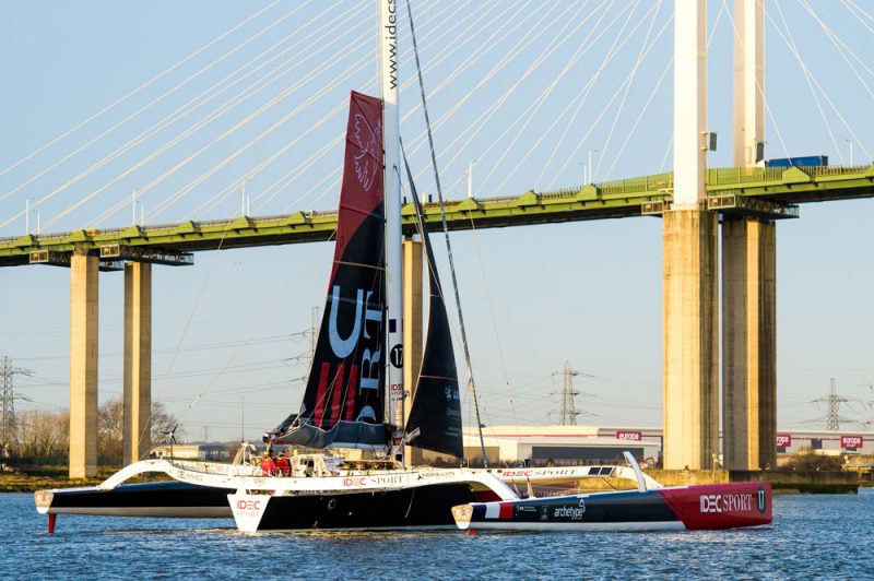 IDEC Sport sails up to the Queen Elizabeth II Bridge.