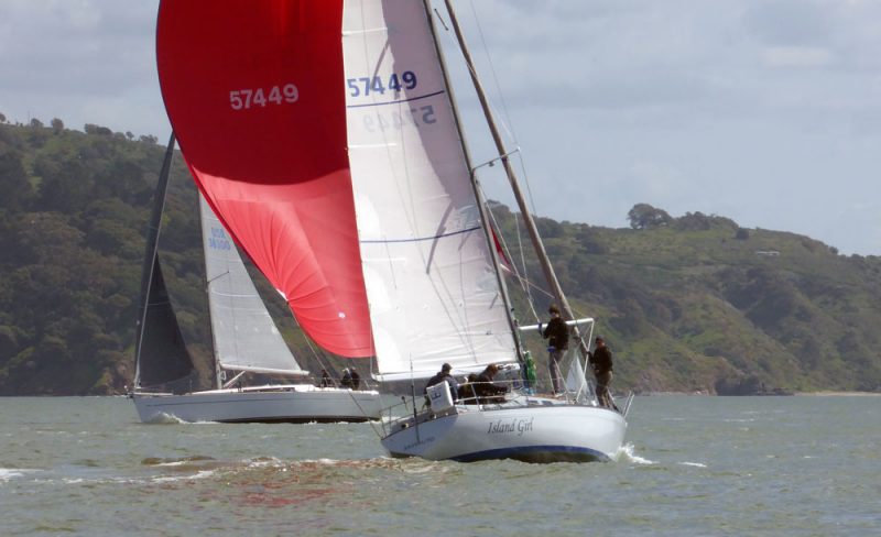 Island Girl with red spinnaker