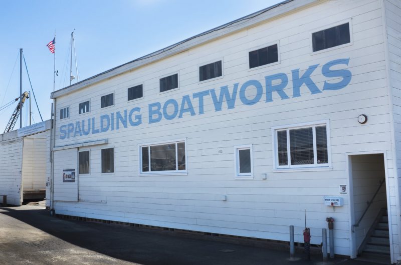 The exterior of the building, with the words Spaulding Boatworks