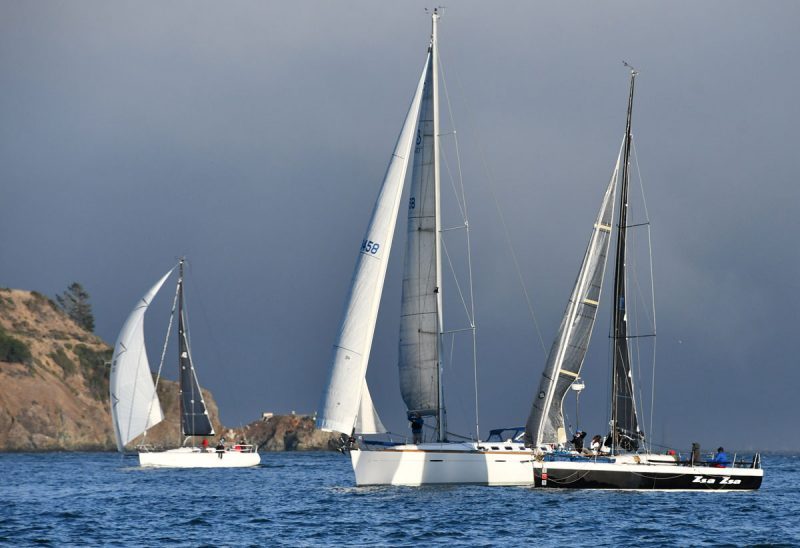 Three boats sail past Angel Island