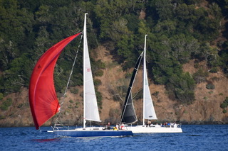 2 boats sail past Angel Island