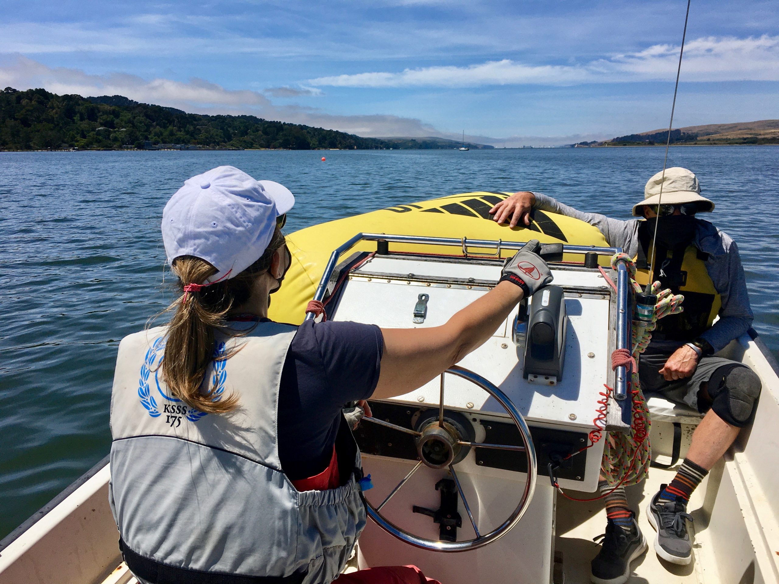 Safety boat driven by Anna-Pia Slothower and Peter Lassetter.