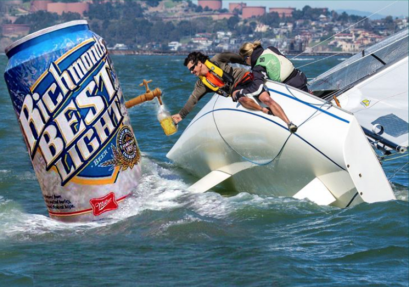 Beer Can Racing poster depicting a sailor leaning over a healed sailboat. He is reaching out to fill a glass beer mug from a spigot on a humungous can of beer floating in the ocean.