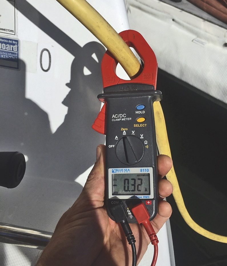 Checking shorepower cord with clamp meter