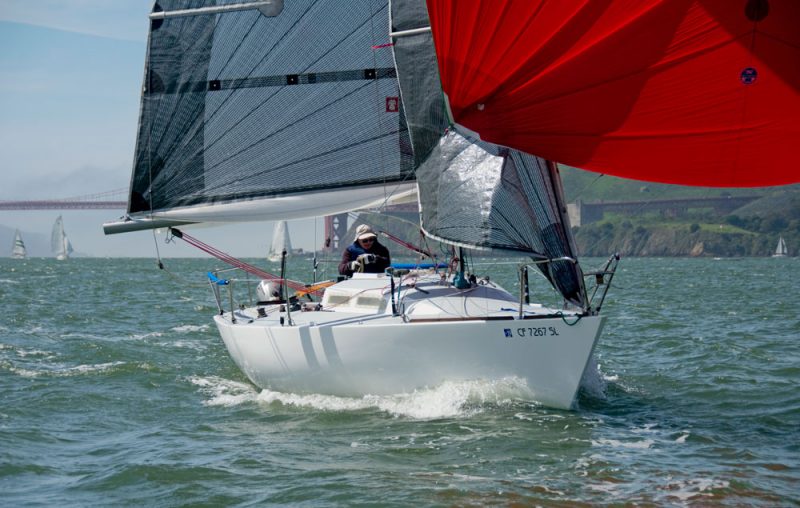 Summertime with red spinnaker