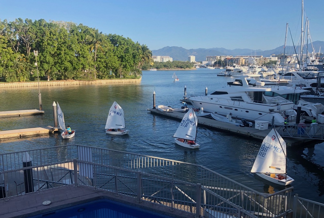 Small boats coming home to Vallarta Yacht Club