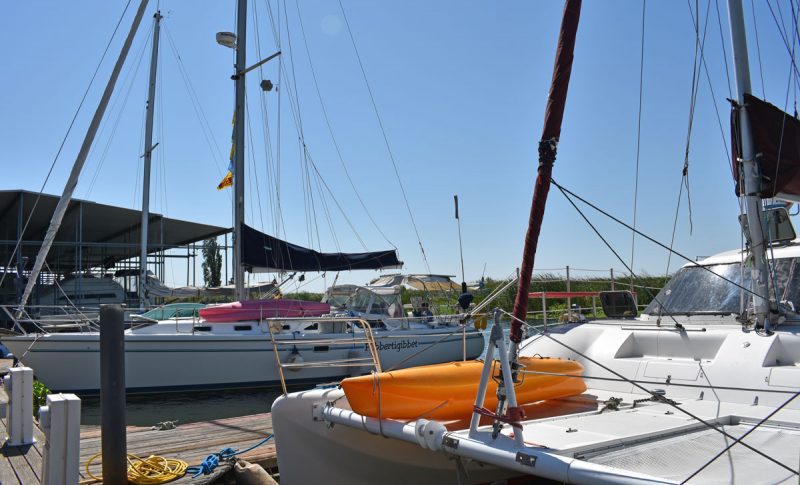 Catalina 42 and cruising cat at the dock