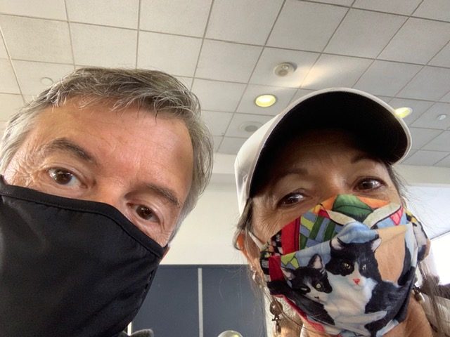 Rich and Laura wearing masks