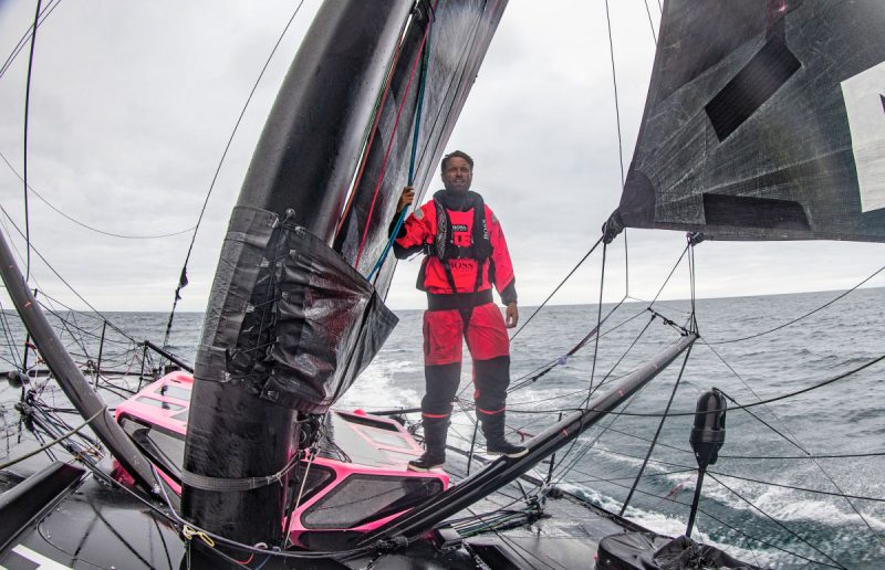 Alex Thomson at the mast