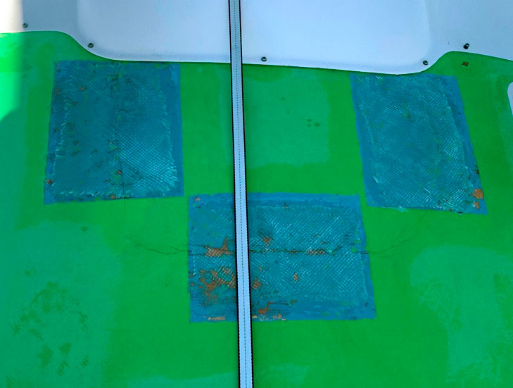 Coach roof patches, blue on green