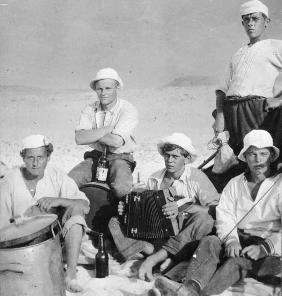 Young sailors with accordion in old-time photo