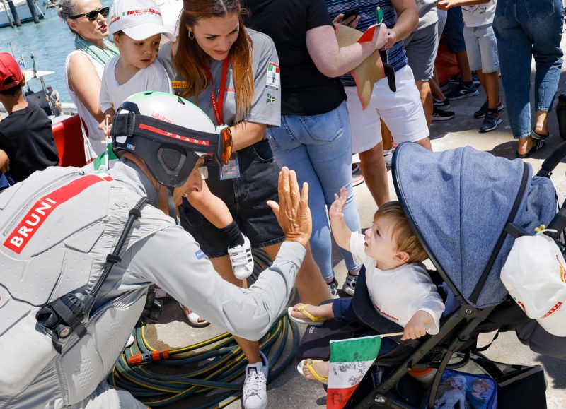 Bruni with toddler fan