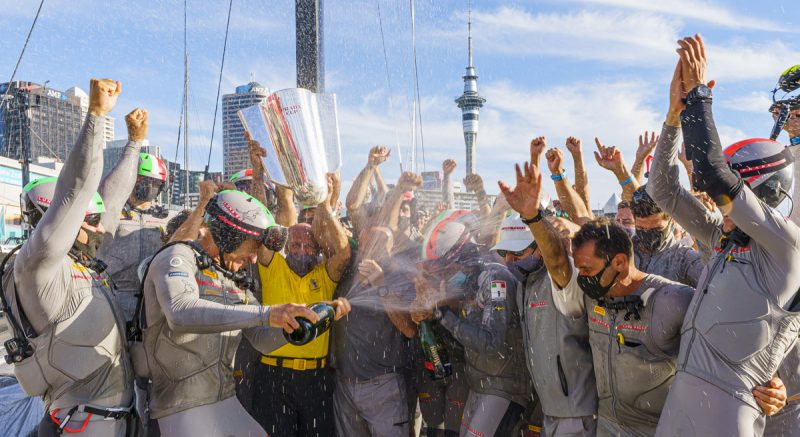 team spraying champagne