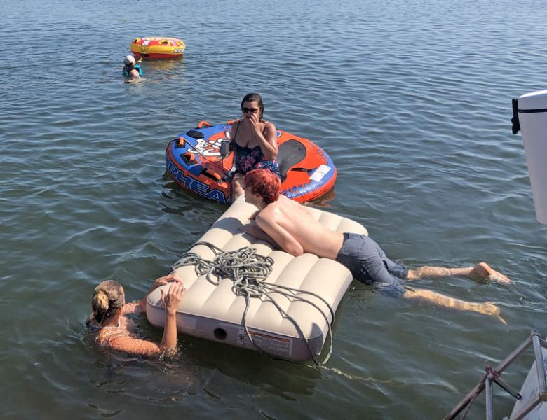 air mattress and floaty toys