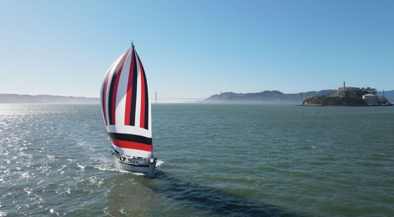 drone shot of Gemini with spinnaker and Alcatraz