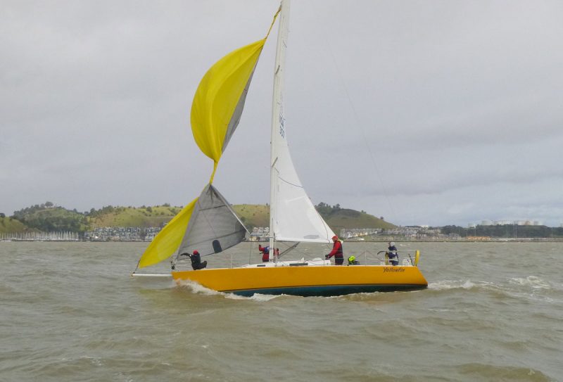 Yellow Fin with spinnaker wrapped around jib.