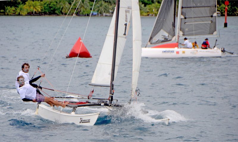 Two guys on a Hobie Cat