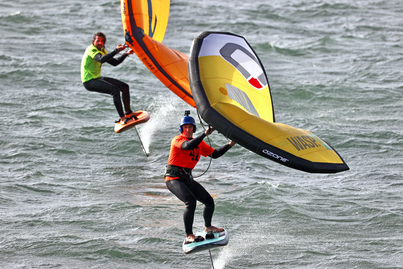 Two wing sailors racing