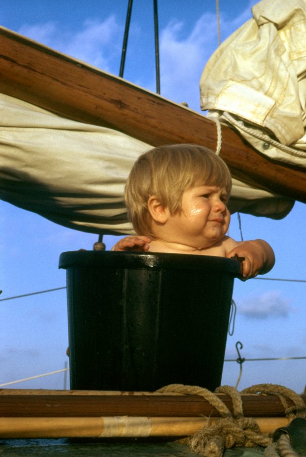 Baby Len in a bucket bath