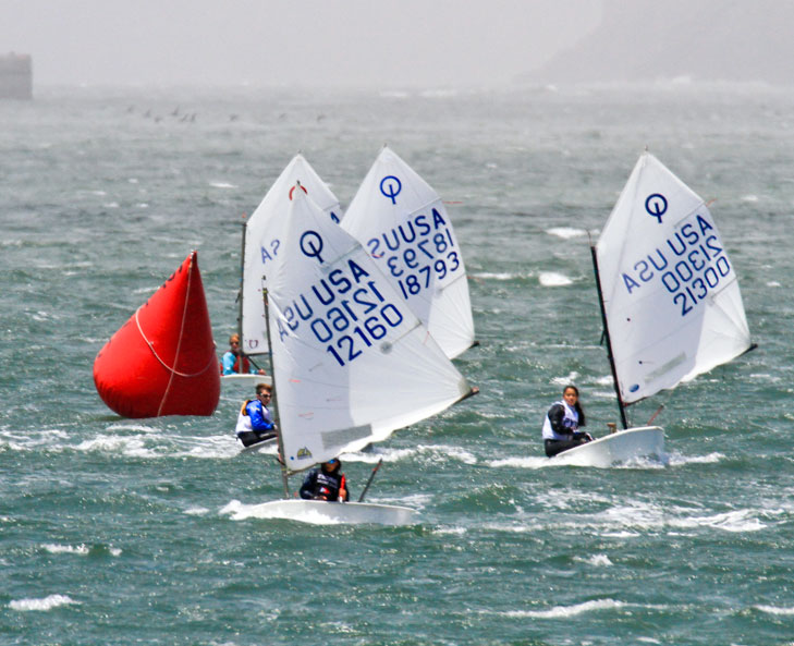 Opti racers, weather mark, whitecaps