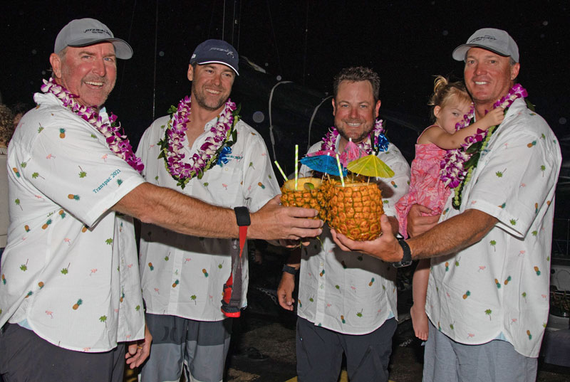 Pyewacket crew with pineapple drinks.