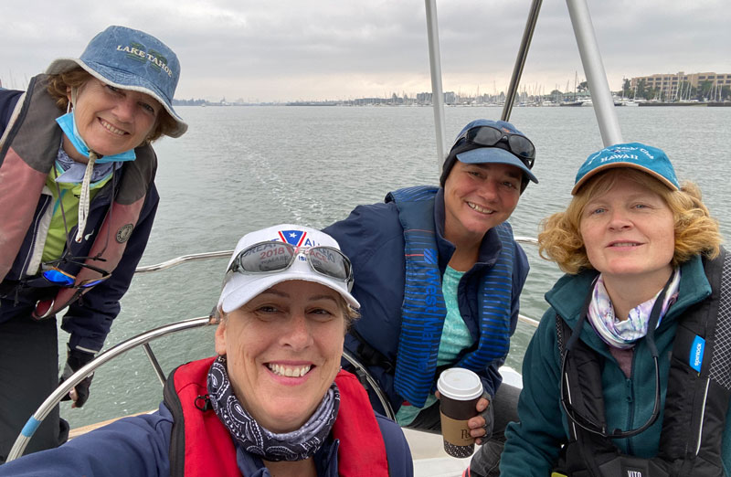 four ladies on a boat