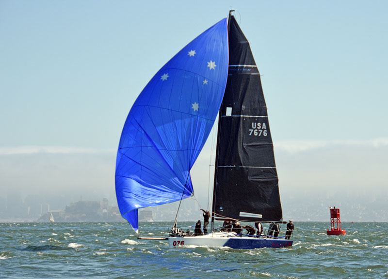 Kuai with blue spinnaker