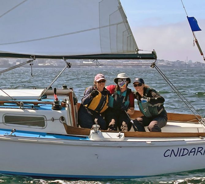 Three women on a Santana 22