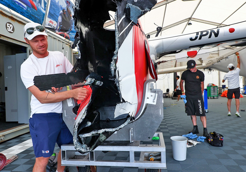 Nathan Outteridge inspects broken bow