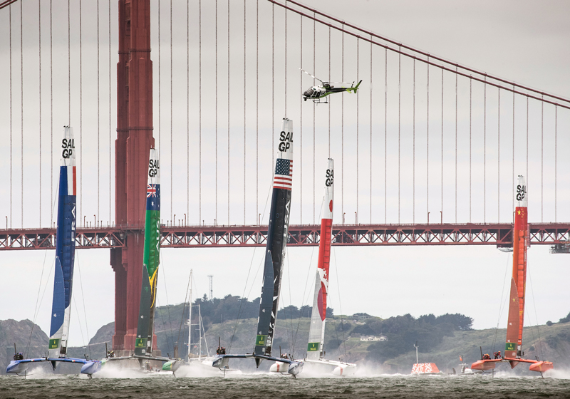 F50 catamarans with Golden Gate Bridge and helicopter
