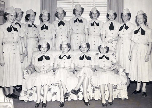 Nurses in long dresses
