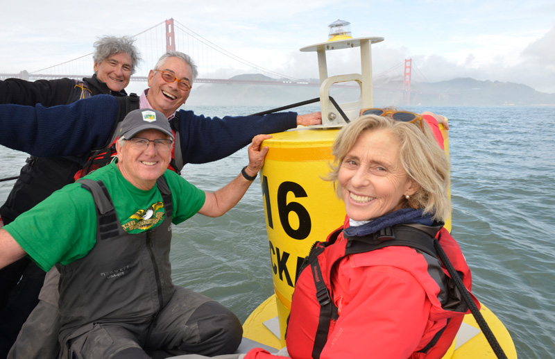 Bruce Stone, Ron Young, Scott Easom, Lisa Williams with buoy